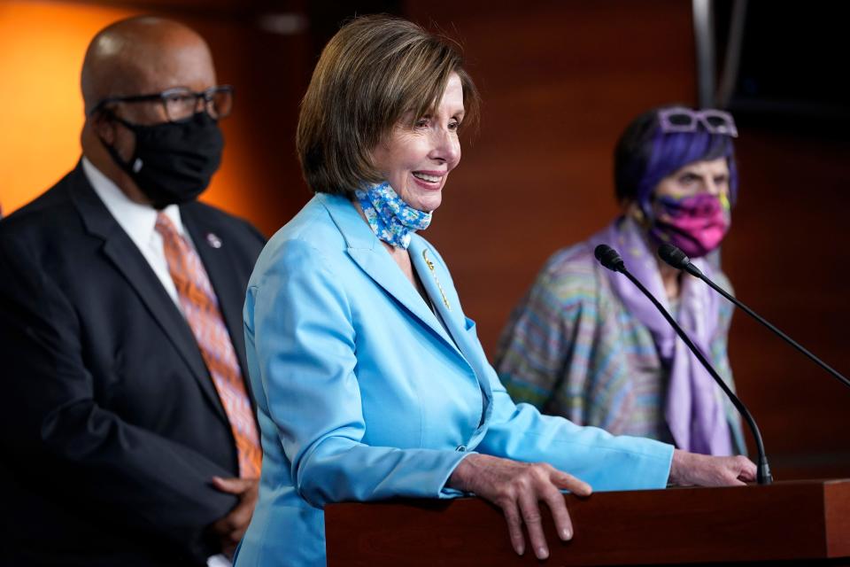 House Speaker Nancy Pelosi of Calif., center, flanked by Rep. Benny Thompson, D-Miss., left, and Rep. Rosa DeLauro, D-Conn., right, talks to reporters on Capitol Hill in Washington, Wednesday, May 19, 2021, about legislation to create an independent, bipartisan commission to investigate the Jan. 6 attack on the United States Capitol Complex.