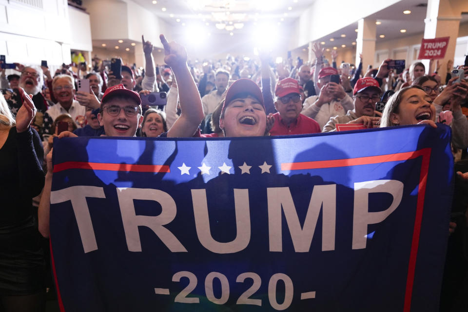 Supporters cheer as Republican presidential candidate former President Donald Trump speaks at a campaign event in Atkinson, N.H., Tuesday, Jan. 16, 2024. (AP Photo/Matt Rourke)