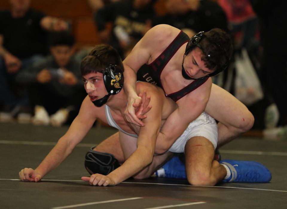 Paolo Ciatto from Iona Prep, top, defeated Cole Joseph from Hackley in the 138 pound weight class at the 8th annual Westchester County Wrestling Championships at Lincoln High School in Yonkers, Jan. 21, 2023. 