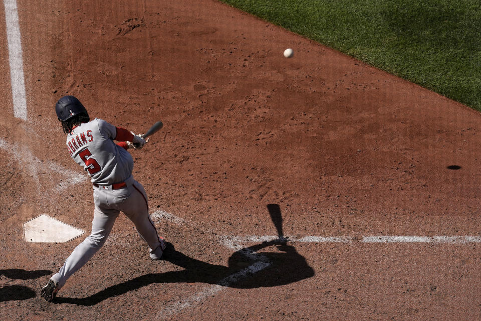 Washington Nationals' CJ Abrams hits a two-run double during the sixth inning of a baseball game against the Kansas City Royals Saturday, May 27, 2023, in Kansas City, Mo. (AP Photo/Charlie Riedel)