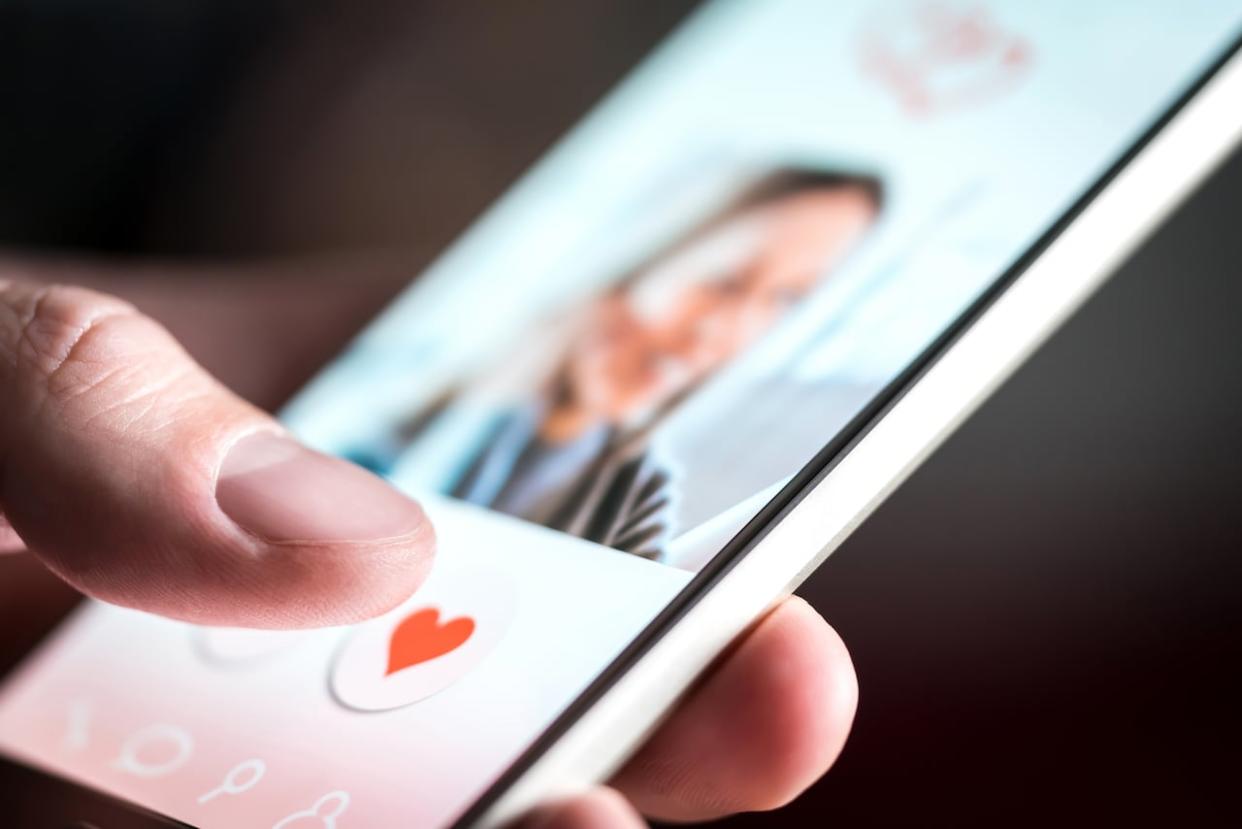 Criminals are targeting romance scam victims after looking at their online profiles and customizing lies to fool them, police say. (Tero Vesalainen/Shutterstock - image credit)