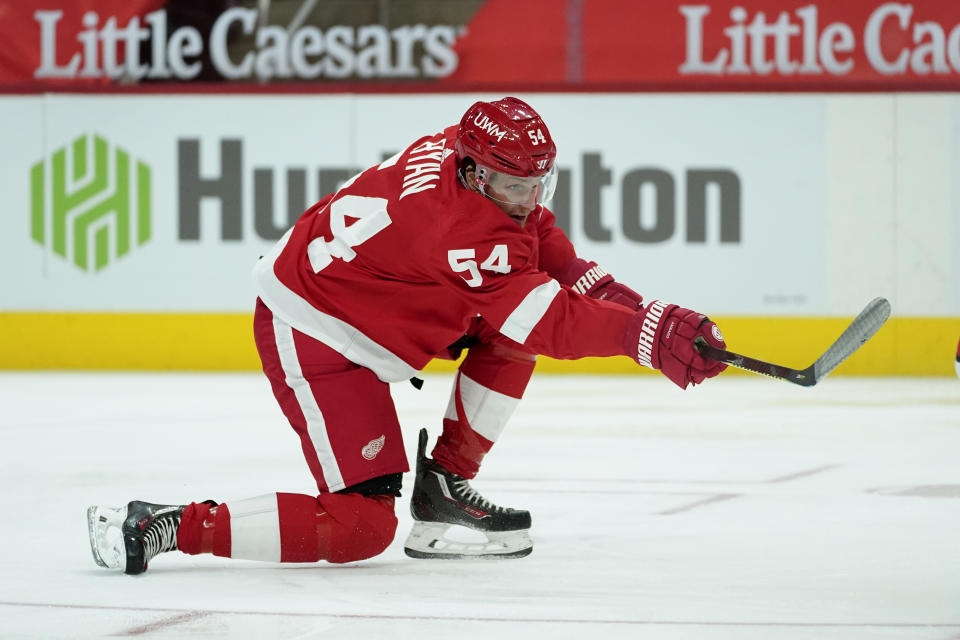 Detroit Red Wings right wing Bobby Ryan shoots against the Carolina Hurricanes in the second period of an NHL hockey game Saturday, Jan. 16, 2021, in Detroit. Ryan scored on the play. (AP Photo/Paul Sancya)