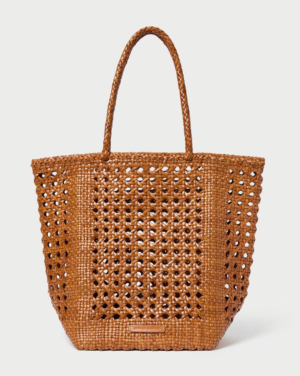 <p><a href="https://go.redirectingat.com?id=74968X1596630&url=https%3A%2F%2Floefflerrandall.com%2Fcollections%2Ftotes%2Fproducts%2Fangelo-timber-woven-leather-tote&sref=https%3A%2F%2Fwww.elle.com%2Ffashion%2Fshopping%2Fg60780046%2Fbest-woven-tote-bags%2F" rel="nofollow noopener" target="_blank" data-ylk="slk:Shop Now;elm:context_link;itc:0;sec:content-canvas" class="link ">Shop Now</a></p><p>Angelo Timber Woven Leather Tote</p><p>$395.00</p>