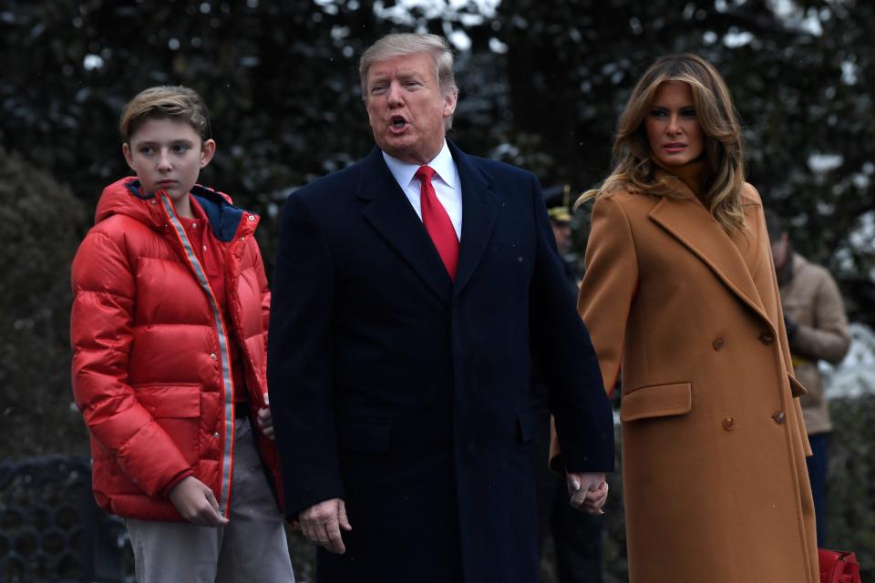 Barron Trump with his parents, President Trump and first lady Melania Trump on Feb. 1, 2019, headed to Marine One on the South Lawn of White House in Washington.