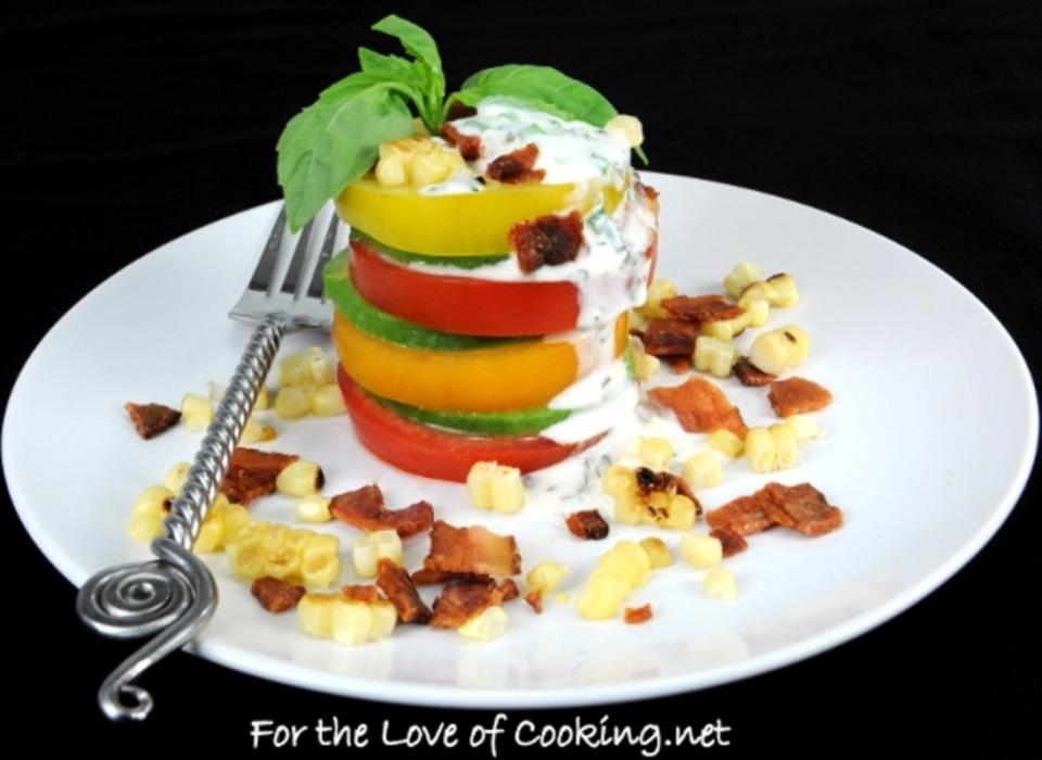 <p>For the Love of Cooking</p><p>What could be better than a salad with tomatoes, corn, bacon, avocado, and creamy ranch dressing? This salad stack, that's what. </p><p><strong>Get the recipe: <a href="http://www.fortheloveofcooking.net/2012/07/tomato-stack-salad-with-corn-bacon-and-avocado.html" rel="nofollow noopener" target="_blank" data-ylk="slk:Tomato Stack Salad with Corn, Bacon, and Avocado;elm:context_link;itc:0;sec:content-canvas" class="link ">Tomato Stack Salad with Corn, Bacon, and Avocado</a></strong></p>