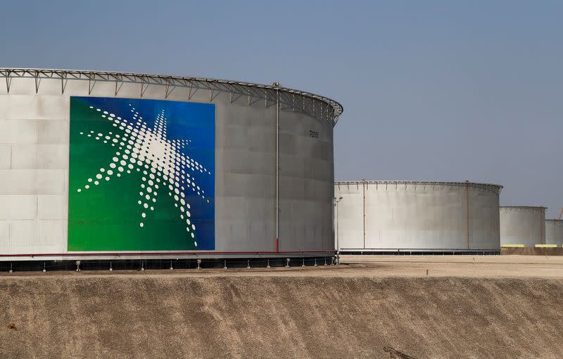 FILE PHOTO: A view shows branded oil tanks at the Saudi Aramco oil facility in Abqaiq