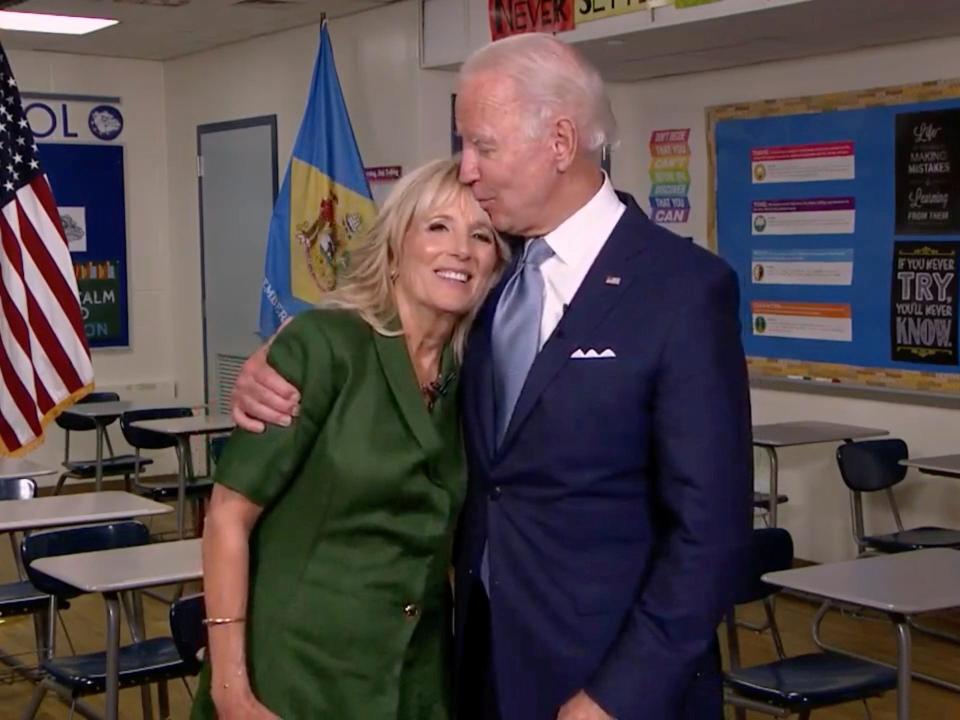 Joe Biden kisses Jill in a classroom at Brandywine High School, where she taught English from 1991 to 1993.