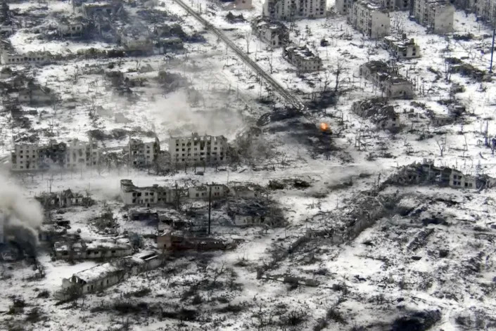 New video footage shot on Feb. 19, 2023 from the air with a drone for The Associated Press shows how particularly intense fighting since the Feb. 24, 2022, invasion has left no building in Marinka intact. Russian tank fire further added to the destruction, pounding what appeared to be Ukrainian positions amid the ruins. (AP Photo)