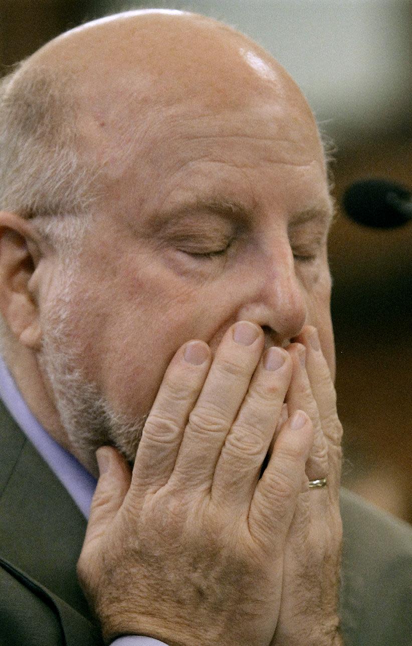 Jerry Stermer, chief of staff to Illinois Gov. Pat Quinn, shows signs of stress while testifying during a House Pension committee hearing at the Illinois State Capitol Thursday, May 31, 2012 in Springfield Ill. (AP Photo/Seth Perlman)