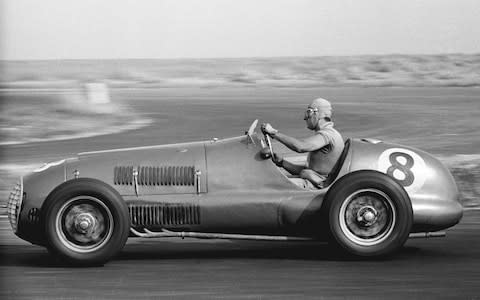 Alberto Ascari cornering in his Ferrari 125/F1 during the International Daily Express Trophy Race; at Silverstone, 20th August 1949. He won the final heat over Farina?s Maserati and Villoresi?s Ferrari. (Photo by Klemantaski Collection/Getty Images) - Credit: Klemantaski Collection/Hulton Archive