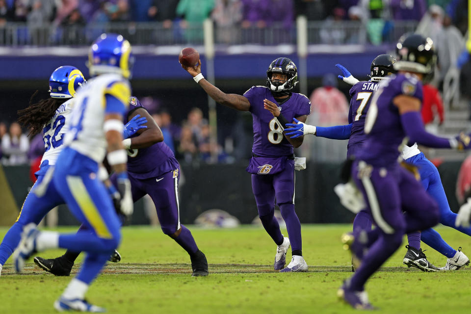 BALTIMORE, MARYLAND – DECEMBER 10: Lamar Jackson #8 of the Baltimore Ravens throws a pass during the second half in the game against the <a class="link " href="https://sports.yahoo.com/nfl/teams/la-rams/" data-i13n="sec:content-canvas;subsec:anchor_text;elm:context_link" data-ylk="slk:Los Angeles Rams;sec:content-canvas;subsec:anchor_text;elm:context_link;itc:0">Los Angeles Rams</a> at M&T Bank Stadium on December 10, 2023 in Baltimore, Maryland. (Photo by Todd Olszewski/Getty Images)