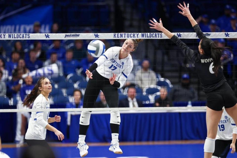 Kentucky freshman outside hitter Brooklyn DeLeye (17) spikes the ball against Wofford during the first round of the NCAA Tournament at Rupp Arena on Thursday. DeLeye has led UK in kills this season.