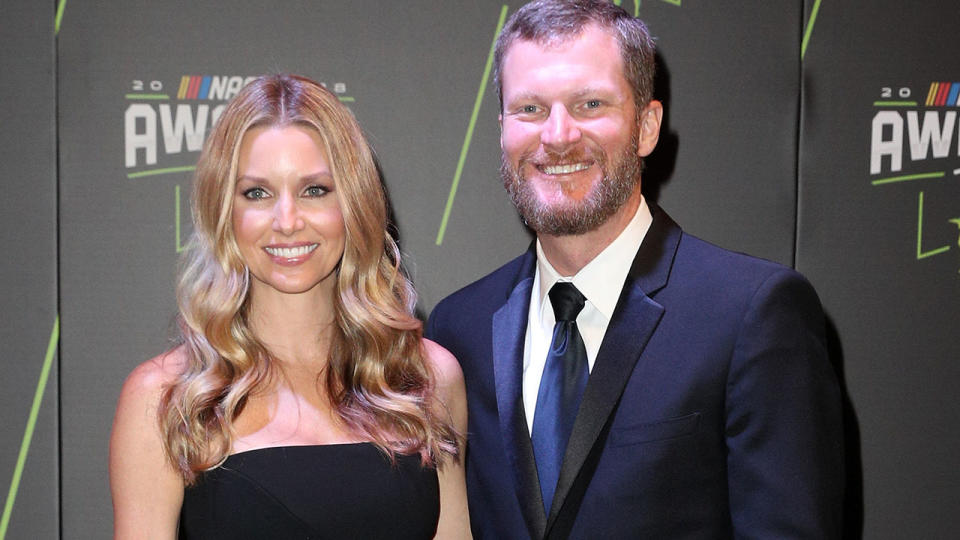 Dale Earnhardt Jr, pictured here with wife Amy in 2018.  (Photo by Chris Graythen/Getty Images)