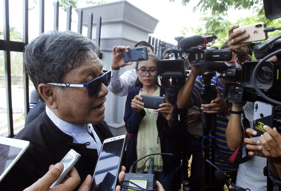 Khin Maung Zaw, a lawyer of two Reuters journalists, Wa Lone and Kyaw Soe Oo, talks to journalists as he leaves the Supreme Court in Naypyitaw, Myanmar, Tuesday, April 23, 2019. Myanmar's Supreme Court on Tuesday rejected the final appeal of two Reuters journalists and upheld seven-year prison sentences for their reporting on the military's brutal crackdown on Rohingya Muslims. (AP Photo/Aung Shine Oo)