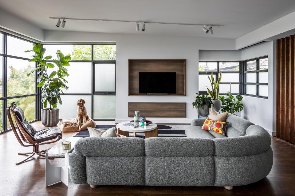 A curved sofa in an Art Deco apartment