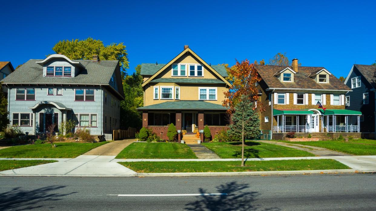 Three houses in a Cleveland, Ohio neighborhood.