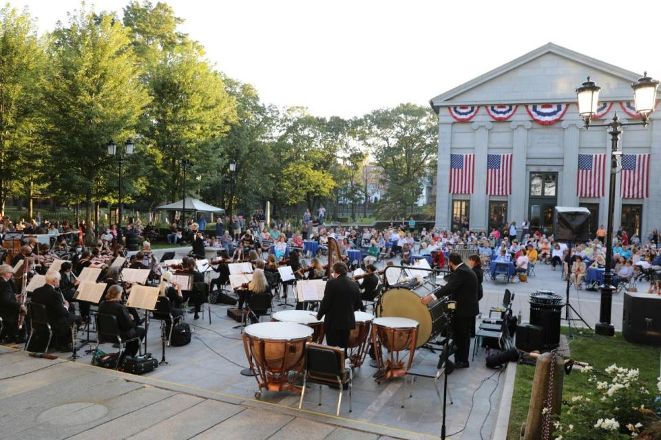 The Quincy Symphony Orchestra performs during a pops concert on the Hancock-Adams Common in Quincy on Saturday, Sept. 18, 2021.