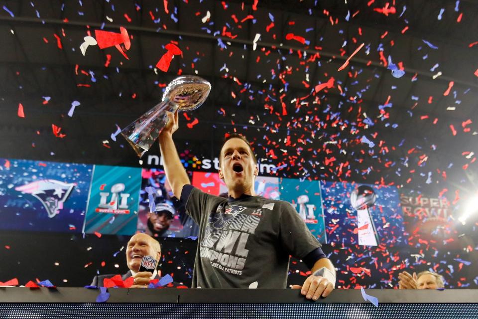 <p>HOUSTON, TX – FEBRUARY 05: Tom Brady #12 of the New England Patriots celebrates with the Vince Lombardi Trophy after defeating the Atlanta Falcons during Super Bowl 51 at NRG Stadium on February 5, 2017 in Houston, Texas. The Patriots defeated the Falcons 34-28. (Photo by Kevin C. Cox/Getty Images) </p>
