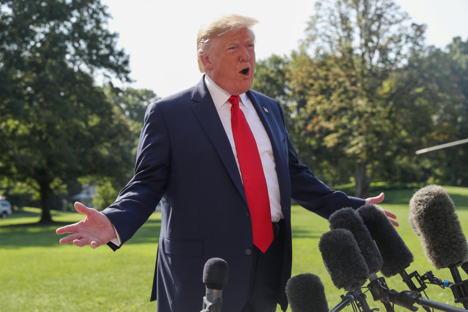 U.S. President Donald Trump talks to reporters as he departs for travel to New York and New Jersey from the South Lawn of the White House in Washington, U.S., August 9, 2019. REUTERS/Leah Millis