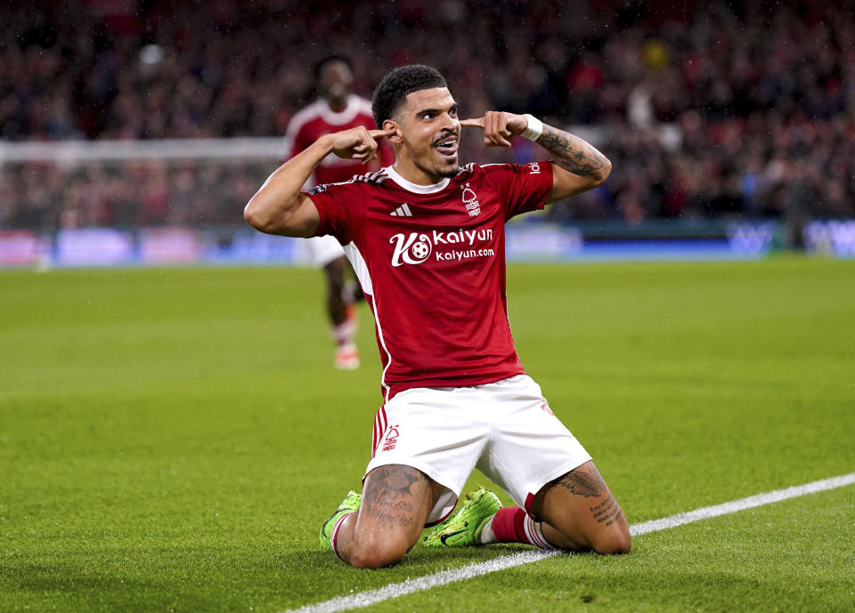Nottingham Forest's Morgan Gibbs-White celebrates scoring their side's third goal during the English Premier League soccer match between Nottingham Forest and Fulham at the City Ground, in Nottingham, England, Tuesday, April 2, 2024. (Bradley Collyer/PA via AP)