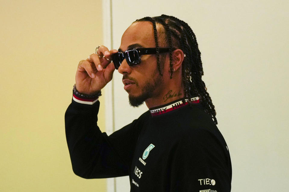 Mercedes driver Lewis Hamilton of Britain arrives for a news conference at the Monza racetrack, in Monza, Italy, Thursday, Sept. 8, 2022. The Formula one race will be held on Sunday. (AP Photo/Luca Bruno)