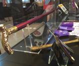 <p>The Joker’s accessories include his purple walking stick, a brutal looking hammer, and plenty of cards.</p>