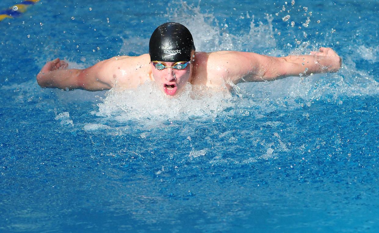 Ashland High School’s Rylan McDaniel competes in the 200-yard IM during the Ohio Cardinal Conference Championships at Wooster High School Saturday, Jan. 15, 2022.