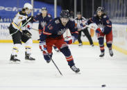 New York Rangers' Alexis Lafreniere (13) chases the puck during the second period of an NHL hockey game against the Boston Bruins Sunday, Feb. 28, 2021, in New York. (Sarah Stier/Pool Photo via AP)