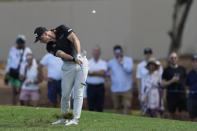 Viktor Hovland of Norway plays his second shot on the first hole during the round two of the DP World Tour Championship golf tournament, in Dubai, United Arab Emirates, Friday, Nov. 17, 2023. (AP Photo/Kamran Jebreili)