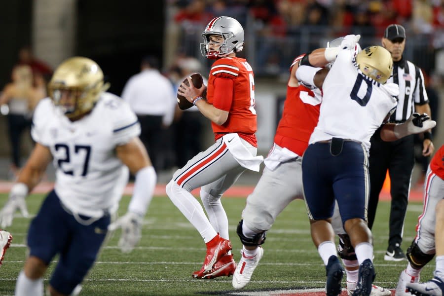 Ohio State quarterback Kyle McCord drops back to pass against Akron during the first half of an NCAA college football game Saturday, Sept. 25, 2021, in Columbus, Ohio. (AP Photo/Jay LaPrete)