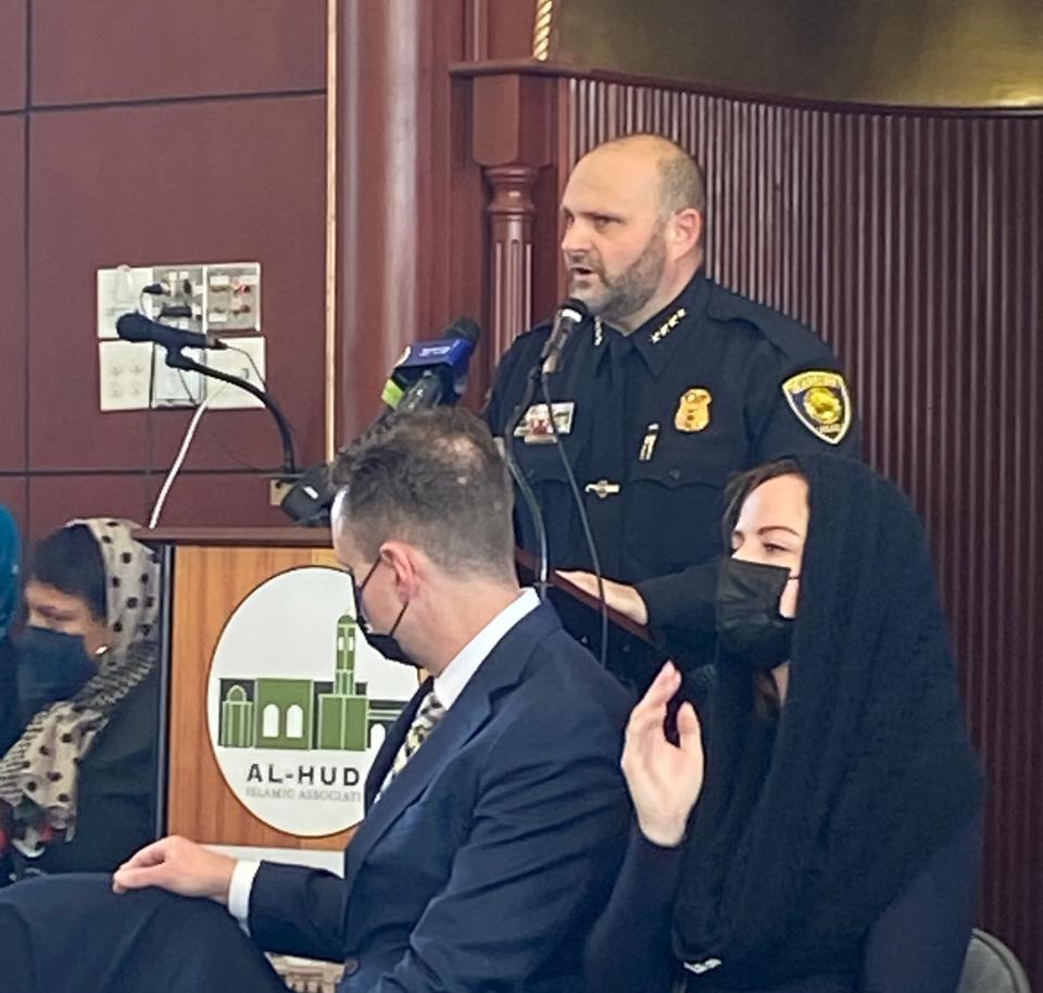 Dearborn Police Chief Issa Shahin speaks in the Al-Huda Islamic Association, a Dearborn mosque, on Feb. 19, 2022, at a forum to discuss a fire at the mosque on Feb. 12 and fatal police shooting blocks away in Detroit of the suspect in the fire. In the front seated are Acting Special Agent in Charge of FBI Detroit Josh Hauxhurst and Dearborn City Councilwoman Erin Byrnes.