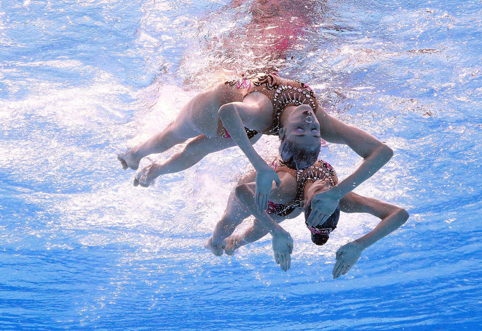 <p>Anna-Maria Alexandri and Eirini Alexandri of Austria compete in the synchronized Women’s Duet Technical Preliminary at the 17th FINA World Aquatics Championships in, Budapest, Hungary, July 14, 2017. (Photo: Michael Dalder/Reuters) </p>