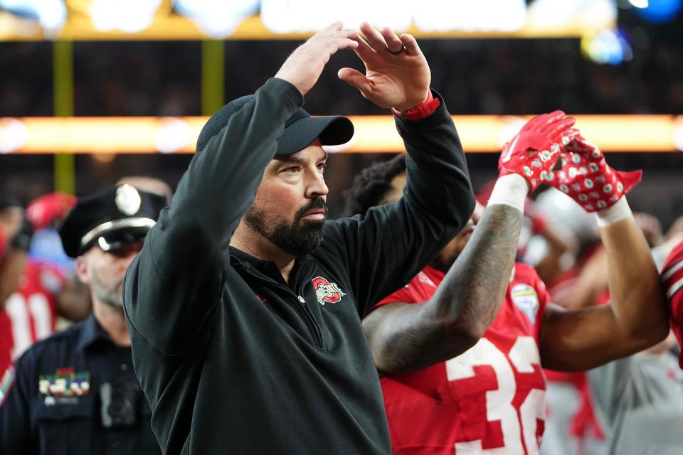 Dec 29, 2023; Arlington, Texas, USA; Ohio State Buckeyes head coach Ryan Day sings “Carmen Ohio” following the 14-3 loss to the Missouri Tigers in the Goodyear Cotton Bowl Classic at AT&T Stadium.