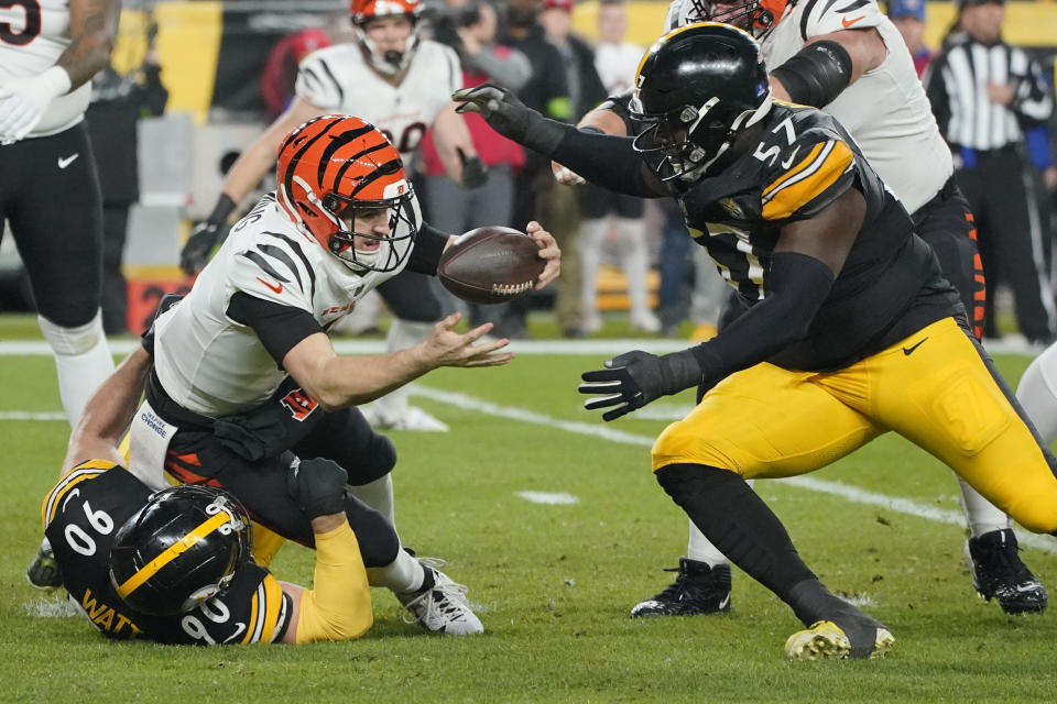 Cincinnati Bengals quarterback Jake Browning (6) is sacked by Pittsburgh Steelers linebacker T.J. Watt (90). (AP Photo/Gene J. Puskar)