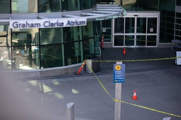 Broken windows are pictured at Vancouver International Airport after the shooting on Sunday.