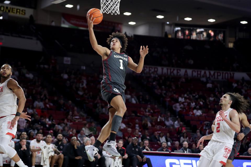 OU forward Jalen Hill (1) goes to the basket against Texas Tech on Tuesday at Lloyd Noble Center in Norman.