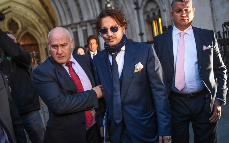 Johnny Depp is seen leaving the Royal Courts of Justice in February - Getty