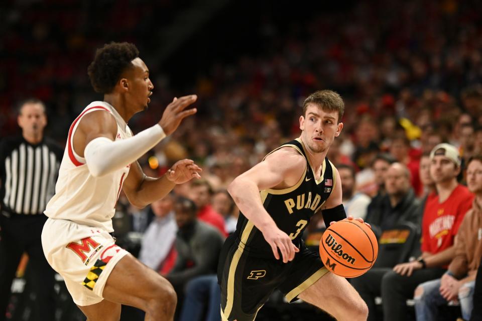 Feb 16, 2023; College Park, Maryland, USA; Purdue Boilermakers guard Braden Smith (3) dribbles down the court as Maryland Terrapins guard Jahmir Young (1) defends during the first half at Xfinity Center. Mandatory Credit: Tommy Gilligan-USA TODAY Sports