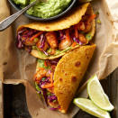 <p>Avocado cuts some of the sour cream in our quick crema loaded with cilantro, for a healthier taco sauce that takes these shrimp tacos to the next level. Shrimp cook up super-fast, making them the ultimate taco filling for a fast weeknight dinner that's also impressive and delicious enough for a weekend dinner party. <a href="https://www.eatingwell.com/recipe/262655/shrimp-tacos-with-avocado-crema/" rel="nofollow noopener" target="_blank" data-ylk="slk:View Recipe;elm:context_link;itc:0;sec:content-canvas" class="link ">View Recipe</a></p>