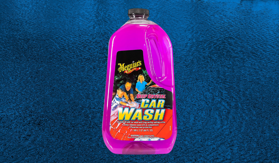 Bottle of hot pink car washing fluid.