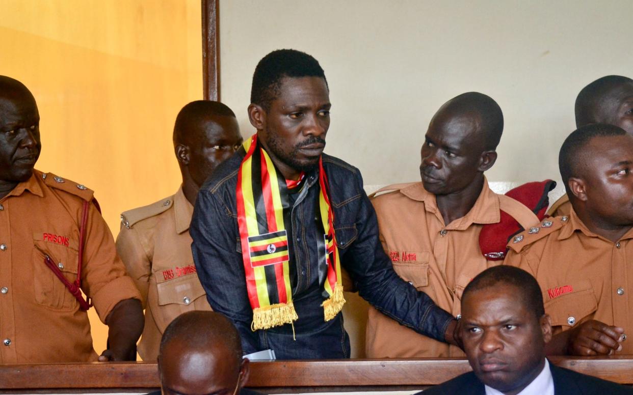 Kyagulanyi Ssentamu, also known as Bobi Wine, appeared in court earlier this month  - AP