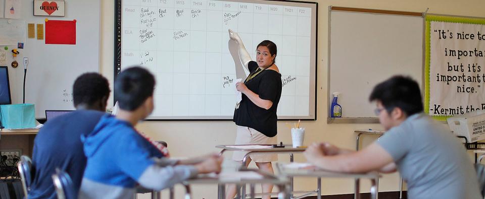 Teacher Kim Crissenger teaches an English class for Quincy middle school students enrolled in the summer school programs at he Central Middle School.