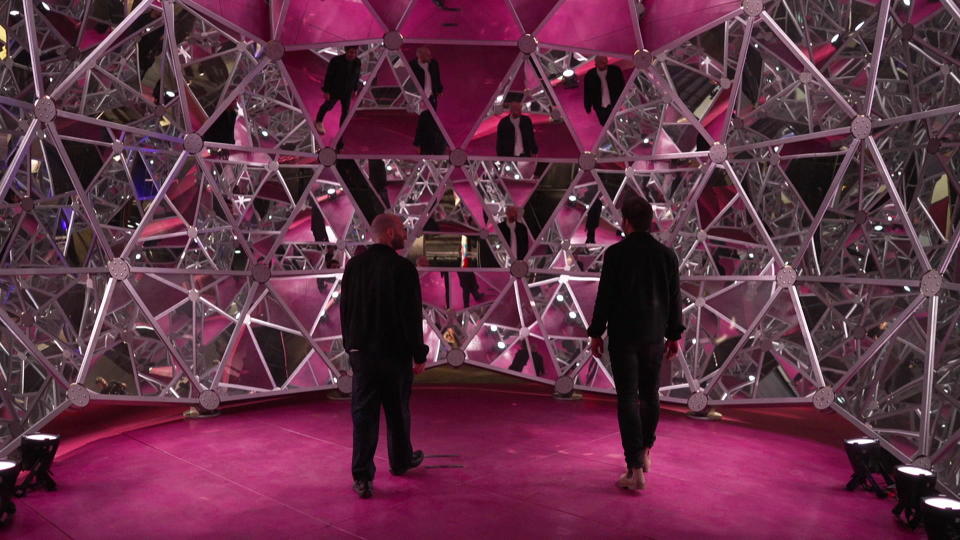 Michael Goldberg and correspondent Jonathan Vigliotti inside Salvador Dalí's Luna Luna pavilion, named Dalídom. / Credit: CBS News