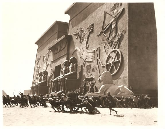 Applied EarthWorks archaeologists uncovered one of the 21 giant sphinxes (shown in its original state) from the 1923 movie "The Ten Commandments."