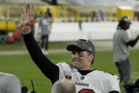 Tampa Bay Buccaneers quarterback Tom Brady waves to spectators after winning the NFC championship NFL football game against the Green Bay Packers in Green Bay, Wis., Sunday, Jan. 24, 2021. The Buccaneers defeated the Packers 31-26 to advance to the Super Bowl. (AP Photo/Morry Gash)