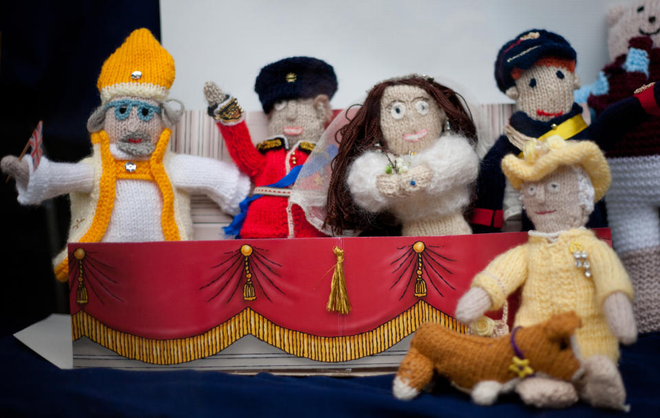 IGHTHAM, UNITED KINGDOM - JUNE 03: Knitted figures of the royal family on display in a window at the Ightham medieval Coxcombe Fair to celebrate Queen Elizabeth II's Diamond Jubilee at Ightham on June 03, 2012 in Ightham, England. For only the second time in its history the UK celebrates the Diamond Jubilee of a monarch. Her Majesty Queen Elizabeth II celebrates the 60th anniversary of her ascension to the throne. Thousands of well-wishers from around the world have flocked to London to witness the spectacle of the weekend’s celebrations. The Queen along with all members of the royal family will participate in a River Pageant with a flotilla of a 1,000 boats accompanying them down The Thames, the star studded free concert at Buckingham Palace, and a carriage procession and a service of thanksgiving at St Paul’s Cathedral. (Photo by Stewart Stanley/Getty Images)