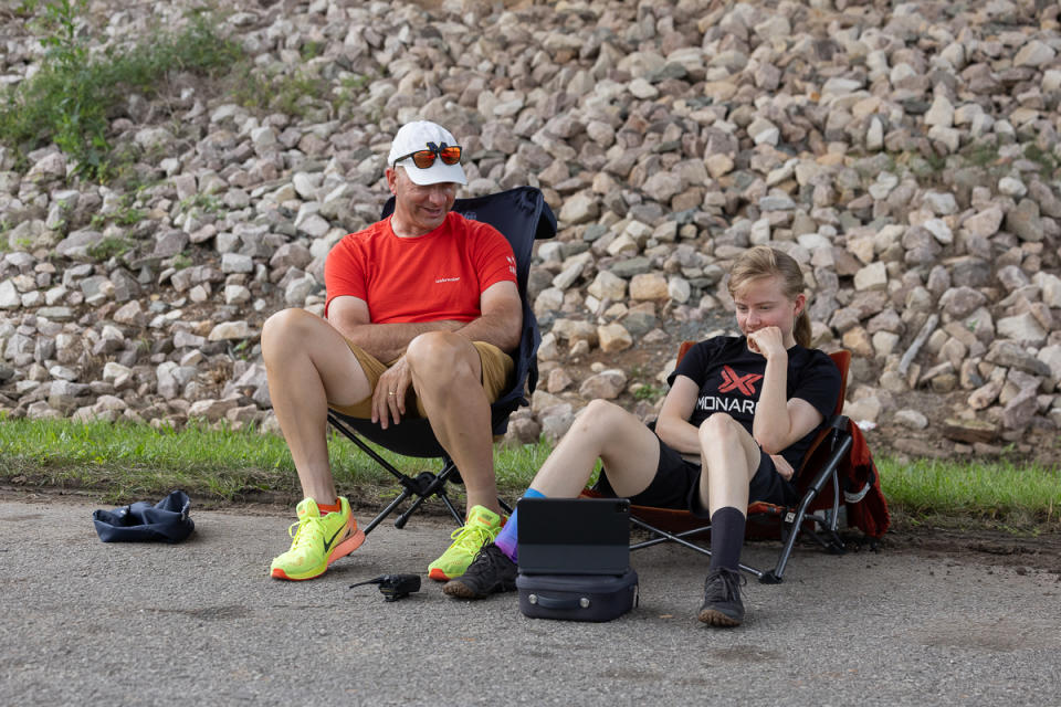 Fans around the course would cheer when the race was going by, and would watch the live stream on a phone/tablet when it was not.