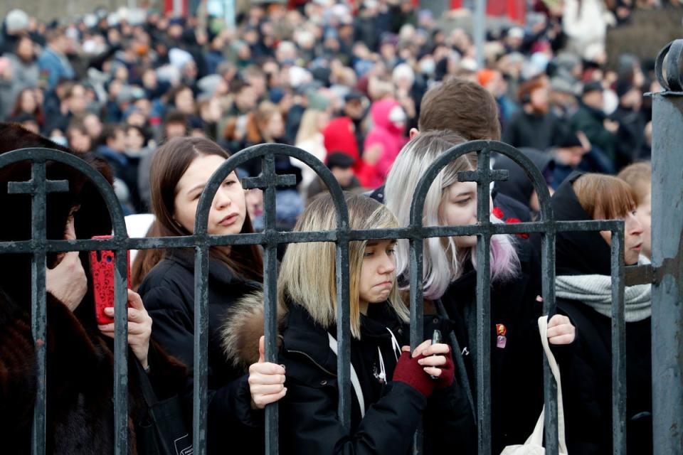 Supporters outside the church in Moscow (EPA)