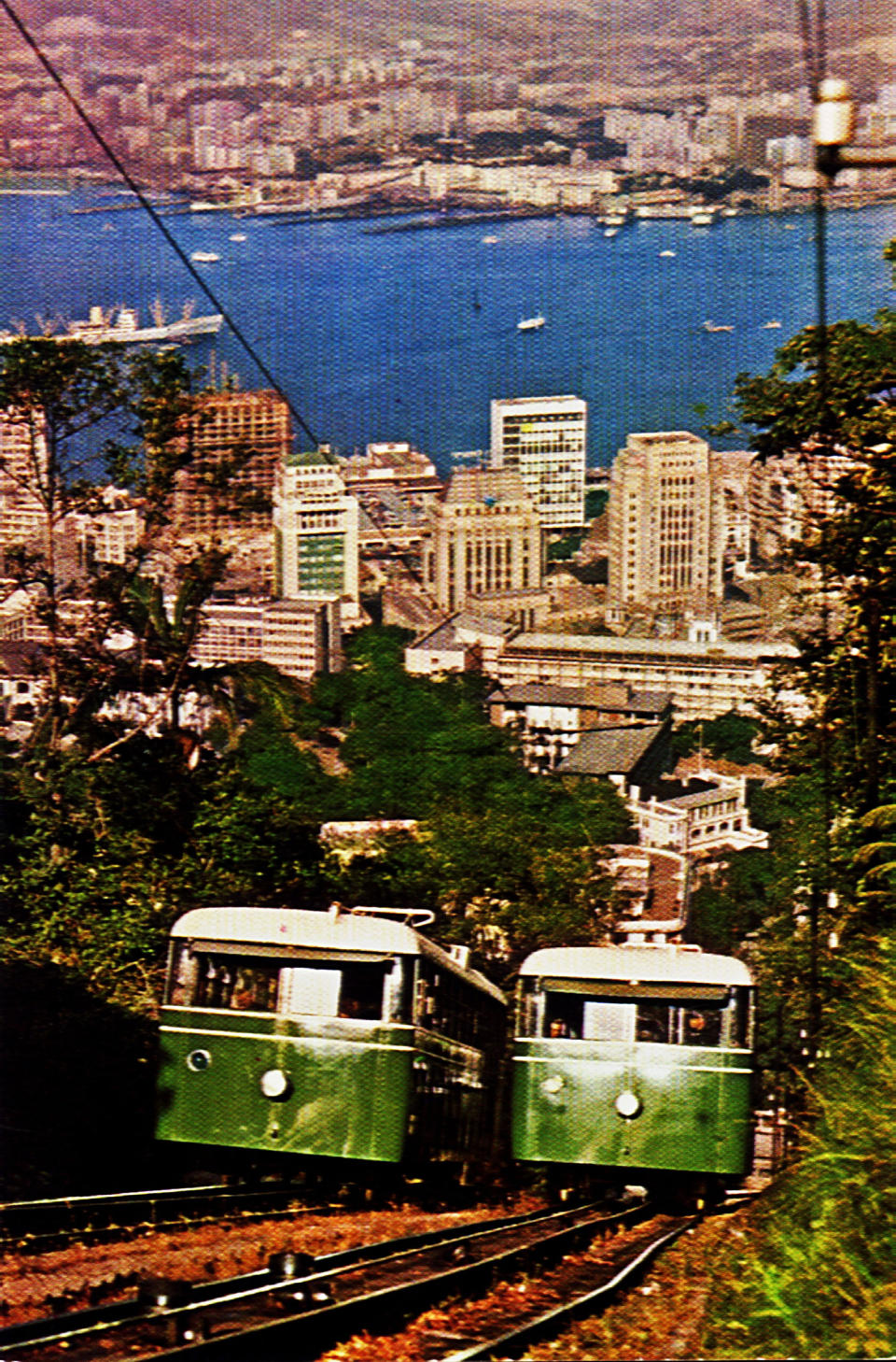 In this undated photo provided by Hong Kong Peak Tramways, a 3rd generation Peak Tram which serviced from 1948-1959 is seen in Hong Kong. The Peak Tram started operations in 1888, when Hong Kong was a British colony, to transport people up Victoria Peak instead of using sedan chairs. The original carriages were made of varnished timber and seated 30 passengers in three classes. (Hong Kong Peak Tramways via AP)