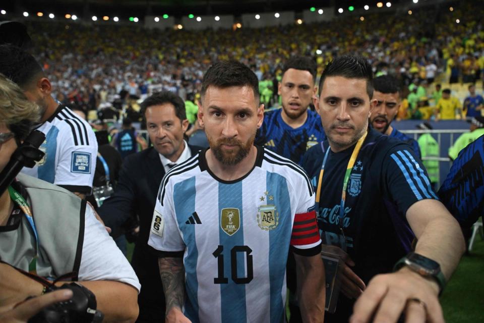 Lionel Messi and other players tried to defuse the situation (AFP via Getty Images)